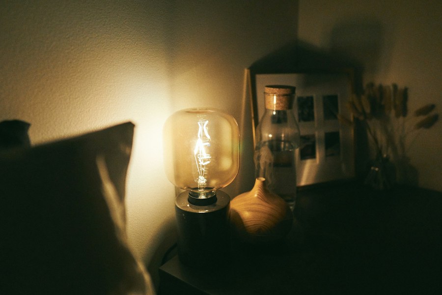 Warm bedside lighting in a bedroom