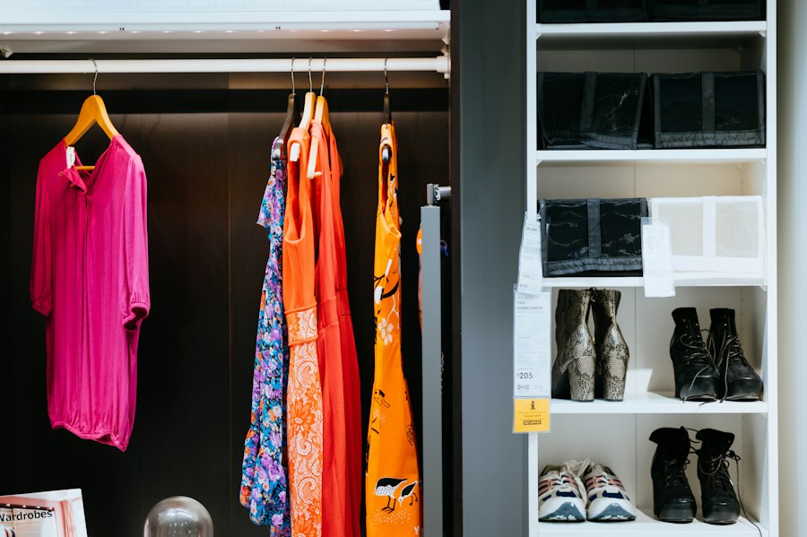 Clothes and shoes arranged in a wardrobe